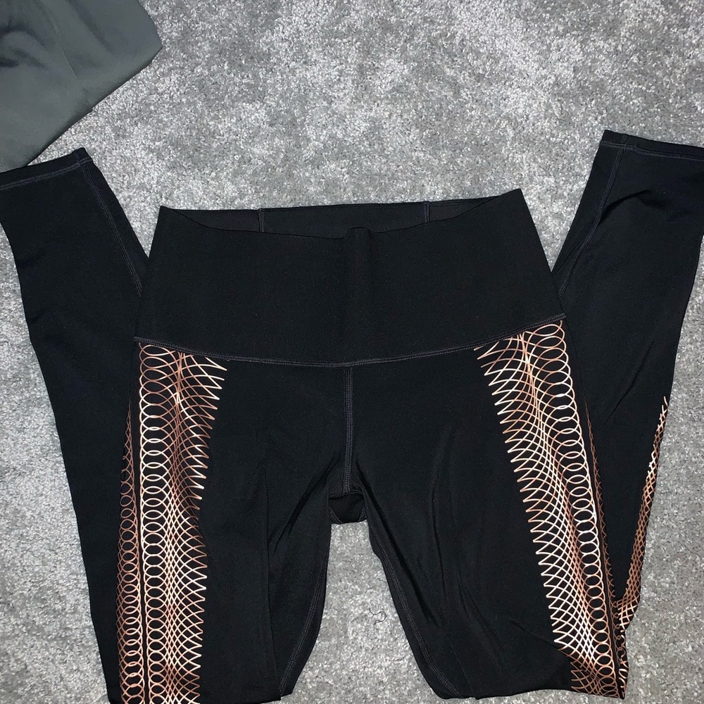 Puma black with copper design sports leggings.